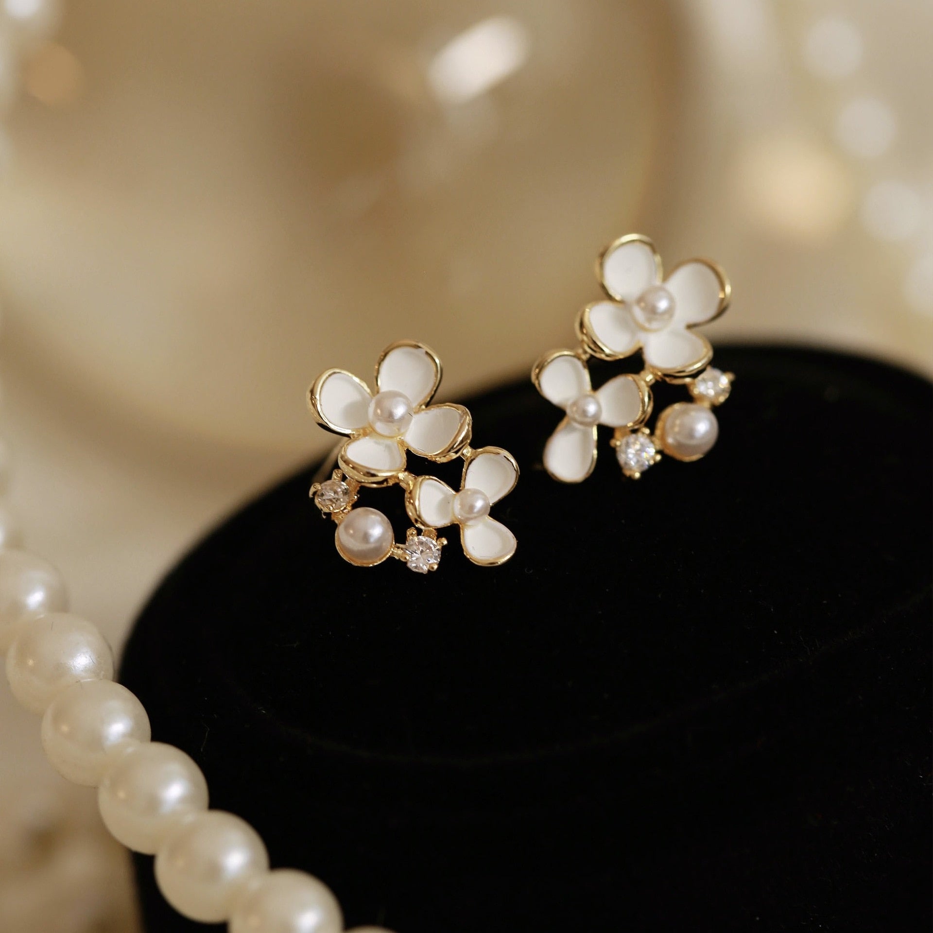 White Flower Clip on Earrings
